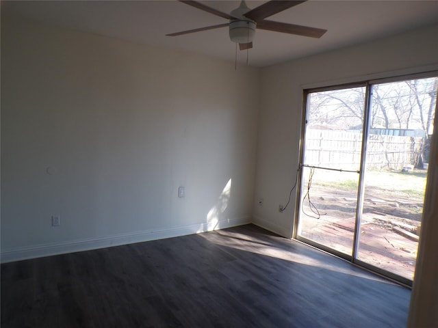 spare room with ceiling fan and hardwood / wood-style flooring