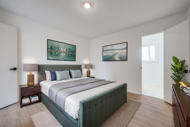 bedroom featuring light wood-type flooring