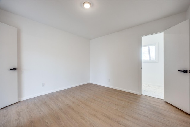 empty room featuring light hardwood / wood-style floors