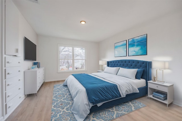 bedroom featuring light hardwood / wood-style flooring