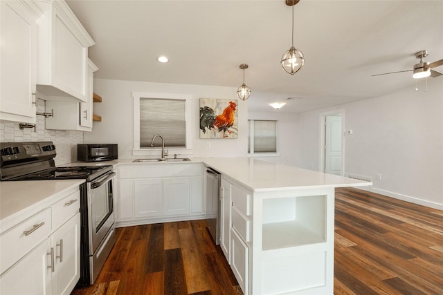 kitchen featuring white cabinets, decorative backsplash, sink, and stainless steel appliances