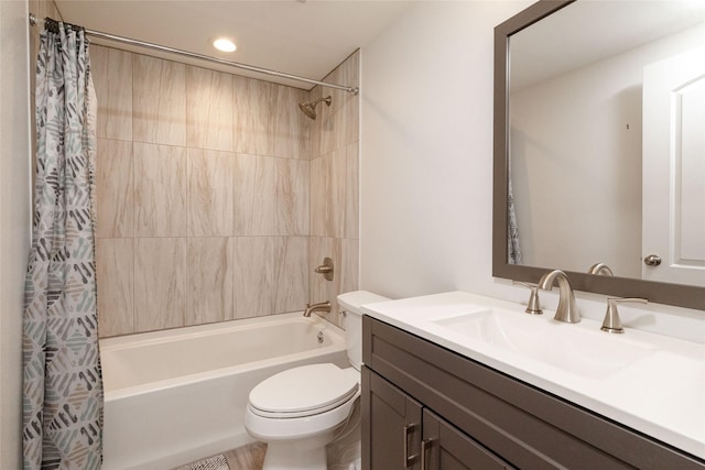 full bathroom with toilet, vanity, and shower / bath combo with shower curtain