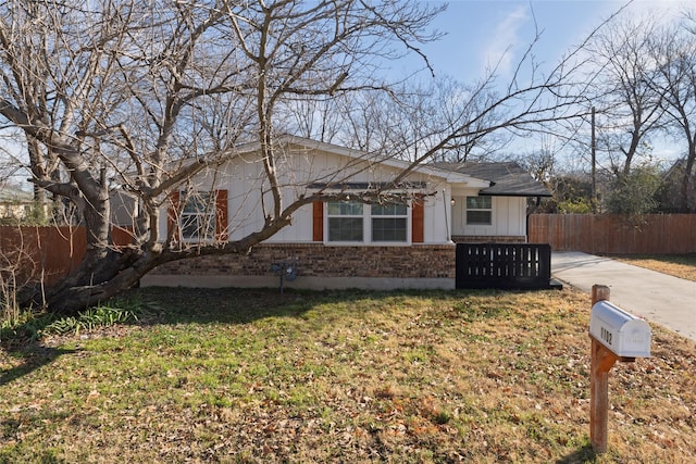 view of front of property with a front lawn