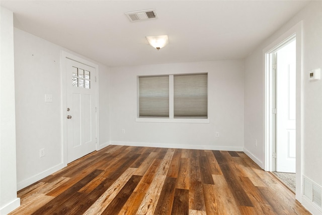 entrance foyer featuring dark hardwood / wood-style floors