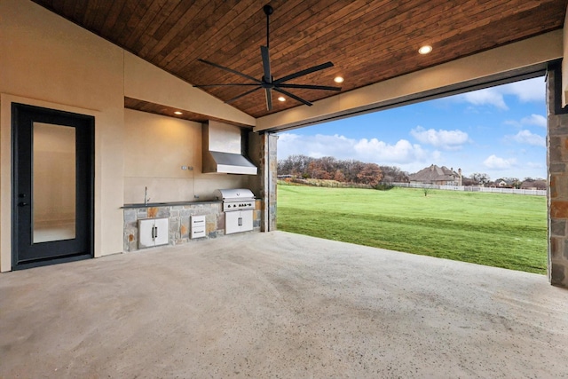 view of patio / terrace with ceiling fan, sink, and area for grilling