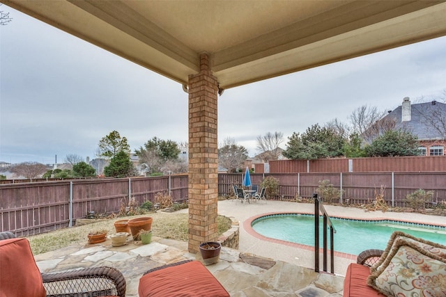 view of pool with a patio area