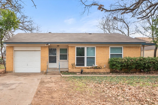 ranch-style house featuring a garage