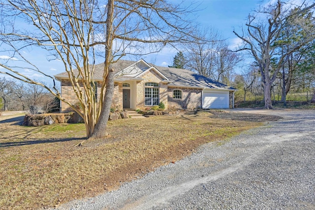 ranch-style home with a garage