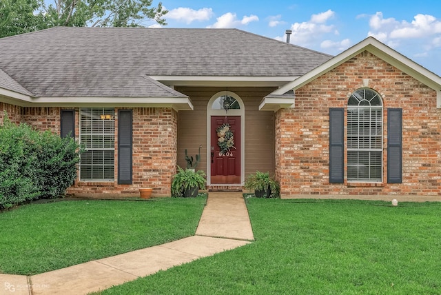 ranch-style house with a front yard