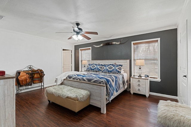 bedroom with ceiling fan, a closet, dark hardwood / wood-style flooring, and multiple windows