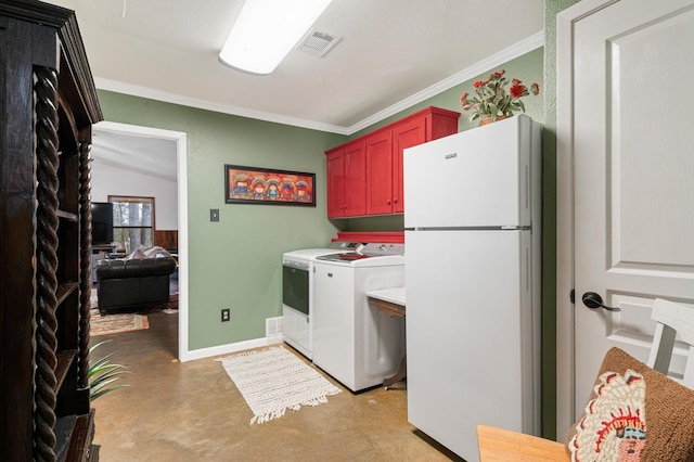 clothes washing area with ornamental molding and independent washer and dryer