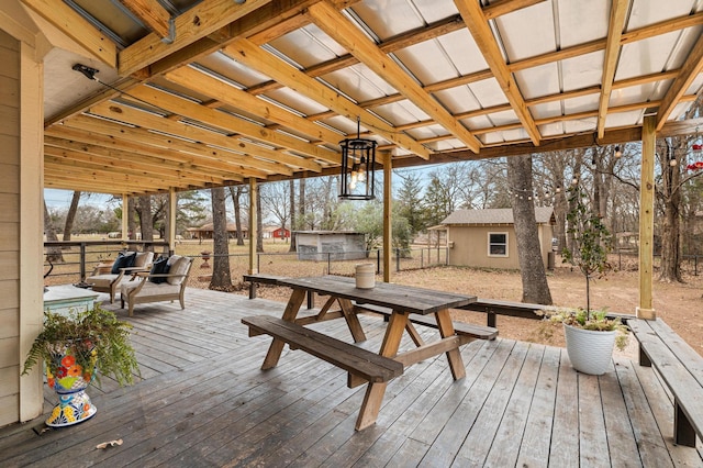 deck with an outbuilding