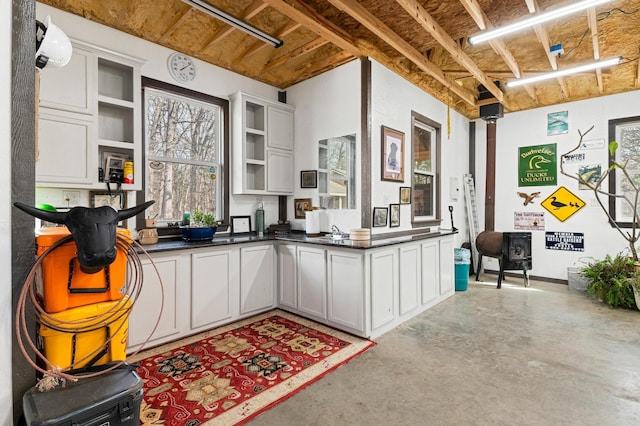 kitchen featuring white cabinets