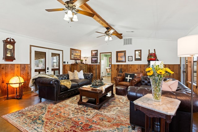 living room with hardwood / wood-style flooring, ceiling fan, french doors, crown molding, and lofted ceiling with beams