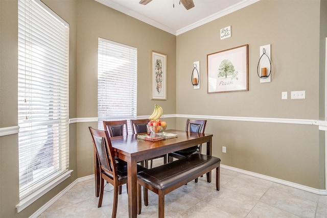 dining room featuring ceiling fan and ornamental molding