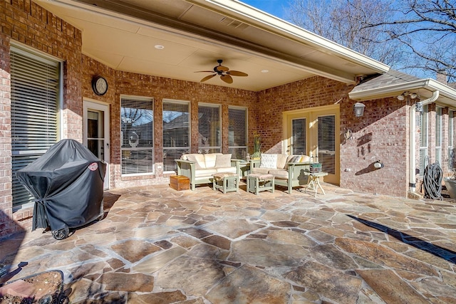 view of patio featuring ceiling fan and outdoor lounge area