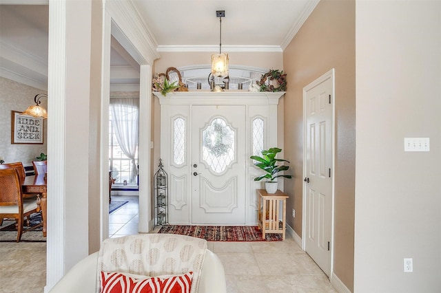 tiled foyer with ornamental molding