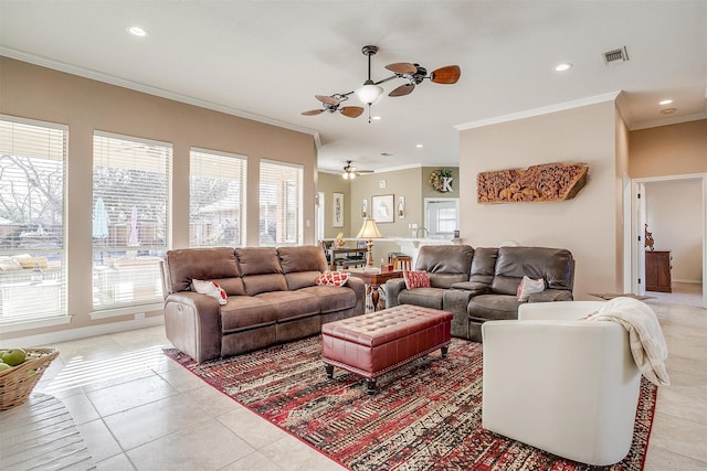 tiled living room featuring ceiling fan and crown molding