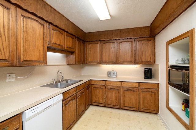 kitchen with sink and dishwasher