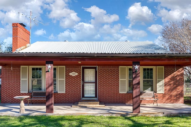 back of house with a porch