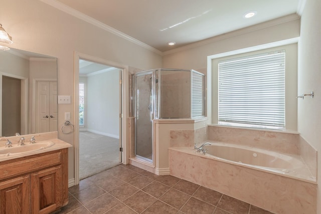 bathroom featuring plenty of natural light, vanity, and ornamental molding