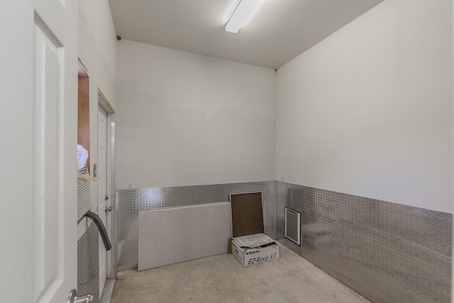 bathroom with concrete floors