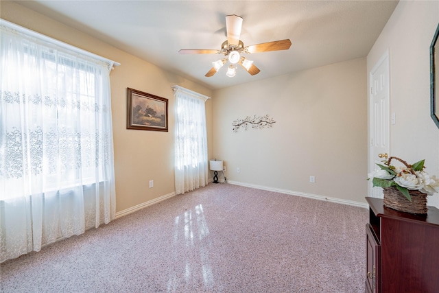 spare room featuring ceiling fan