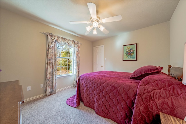 bedroom featuring ceiling fan and carpet floors