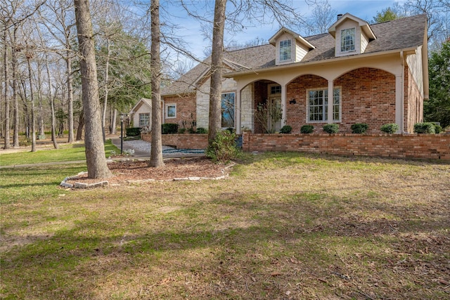 view of front of home with a front yard