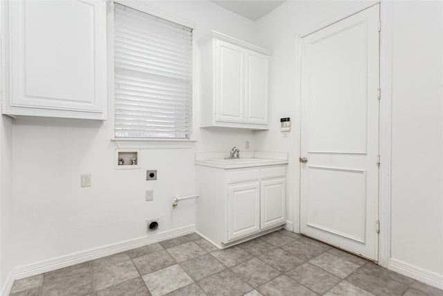 laundry room featuring cabinets, hookup for a washing machine, sink, and electric dryer hookup