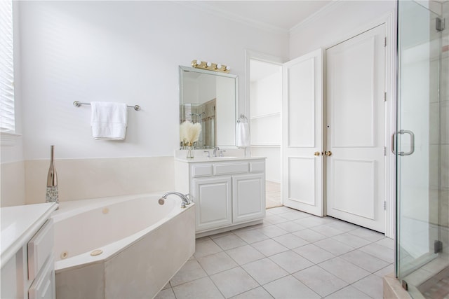 bathroom with vanity, tile patterned floors, crown molding, and shower with separate bathtub