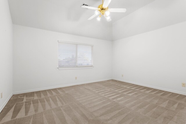 walk in closet with light carpet