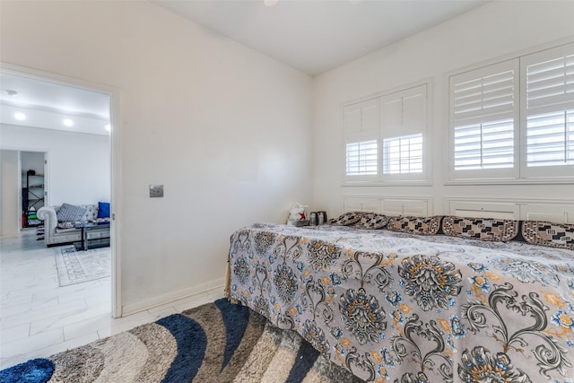 bedroom featuring light tile patterned floors