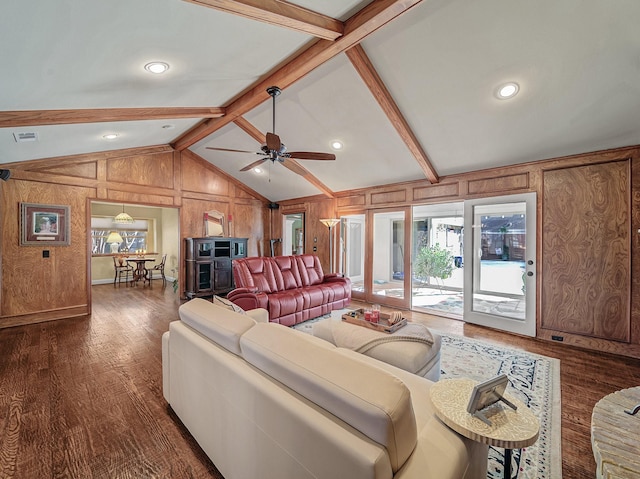 living room featuring ceiling fan, lofted ceiling with beams, and dark hardwood / wood-style flooring