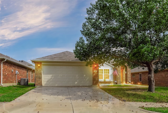 3729 Cook Ct, Fort Worth, TX 76244 - view of front of property featuring concrete driveway, an attached garage, brick siding, and central AC unit
