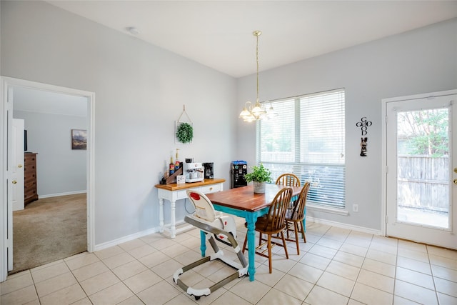 3729 Cook Ct, Fort Worth, TX 76244 - dining room with healthy amount of natural light, a chandelier, light tile patterned flooring, and baseboards