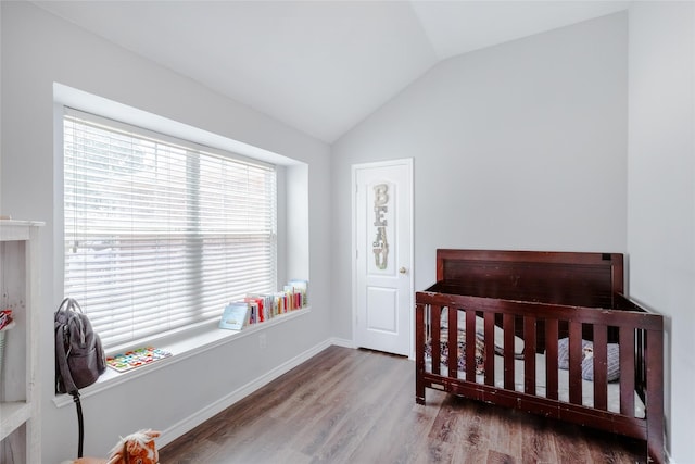 3729 Cook Ct, Fort Worth, TX 76244 - bedroom with vaulted ceiling, wood finished floors, a crib, and baseboards