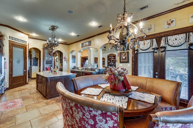 dining room featuring french doors and ornamental molding