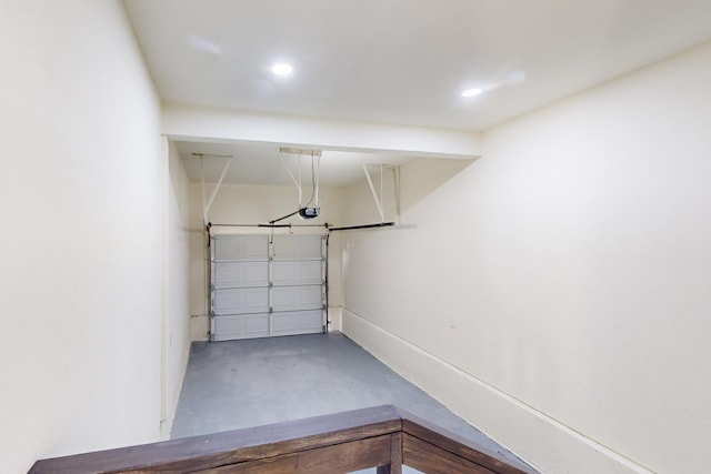 garage featuring a garage door opener