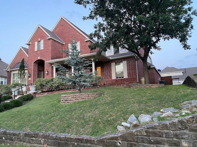 view of front facade with a front yard