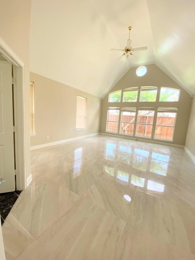 interior space with vaulted ceiling and ceiling fan