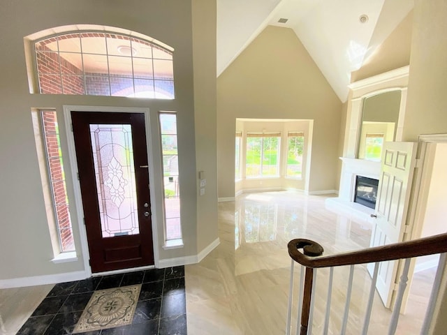 foyer with a towering ceiling