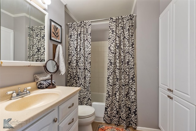 full bathroom featuring toilet, crown molding, vanity, and shower / tub combo with curtain