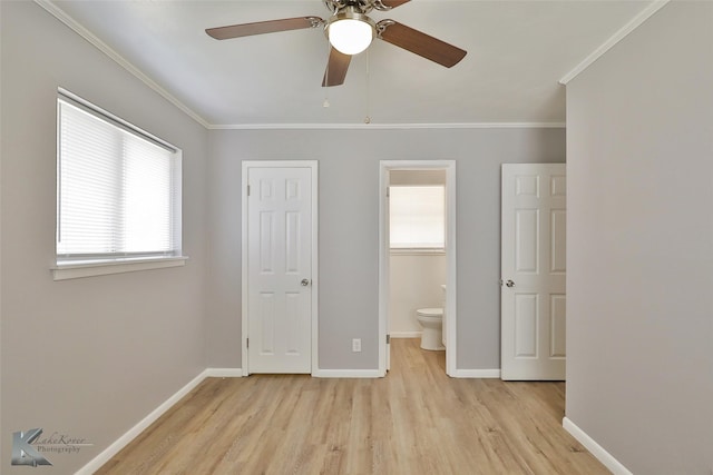 unfurnished bedroom with ceiling fan, light hardwood / wood-style floors, ornamental molding, connected bathroom, and a closet