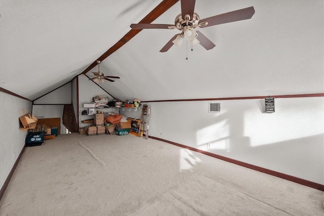 additional living space featuring ceiling fan, carpet, and lofted ceiling