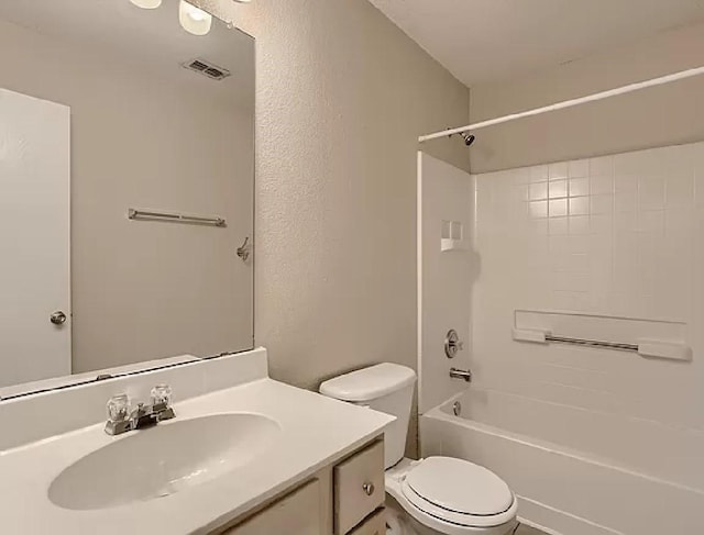 full bathroom featuring toilet, vanity, and bathing tub / shower combination