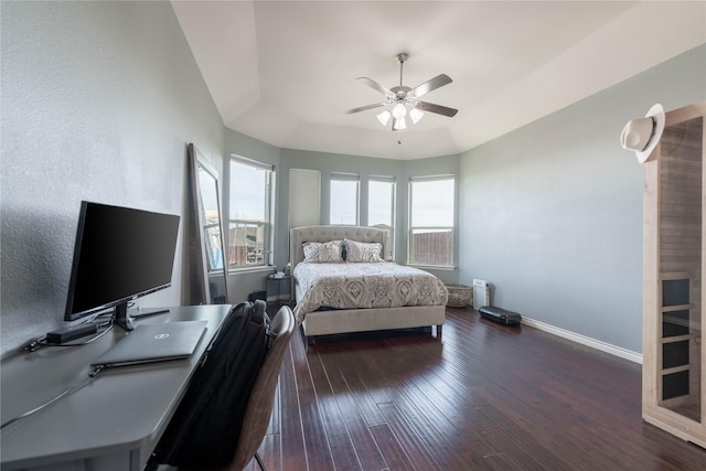 bedroom featuring ceiling fan and dark wood-type flooring