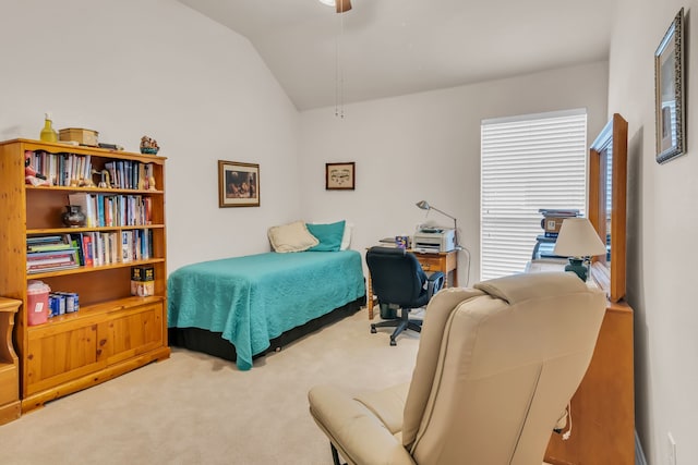 carpeted bedroom with ceiling fan and lofted ceiling