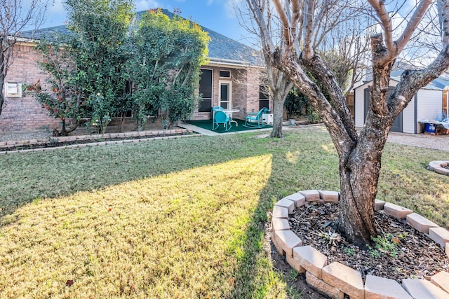 view of yard with a patio area