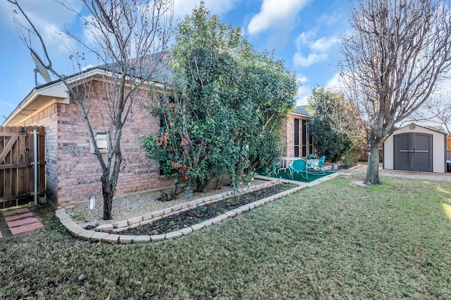 view of front facade with a front yard and a storage unit